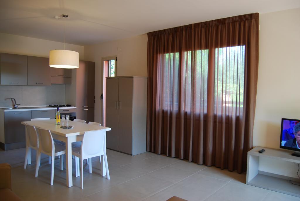 Residenze Al Colle Dei Pini Aparthotel Ριτσόνε Δωμάτιο φωτογραφία
