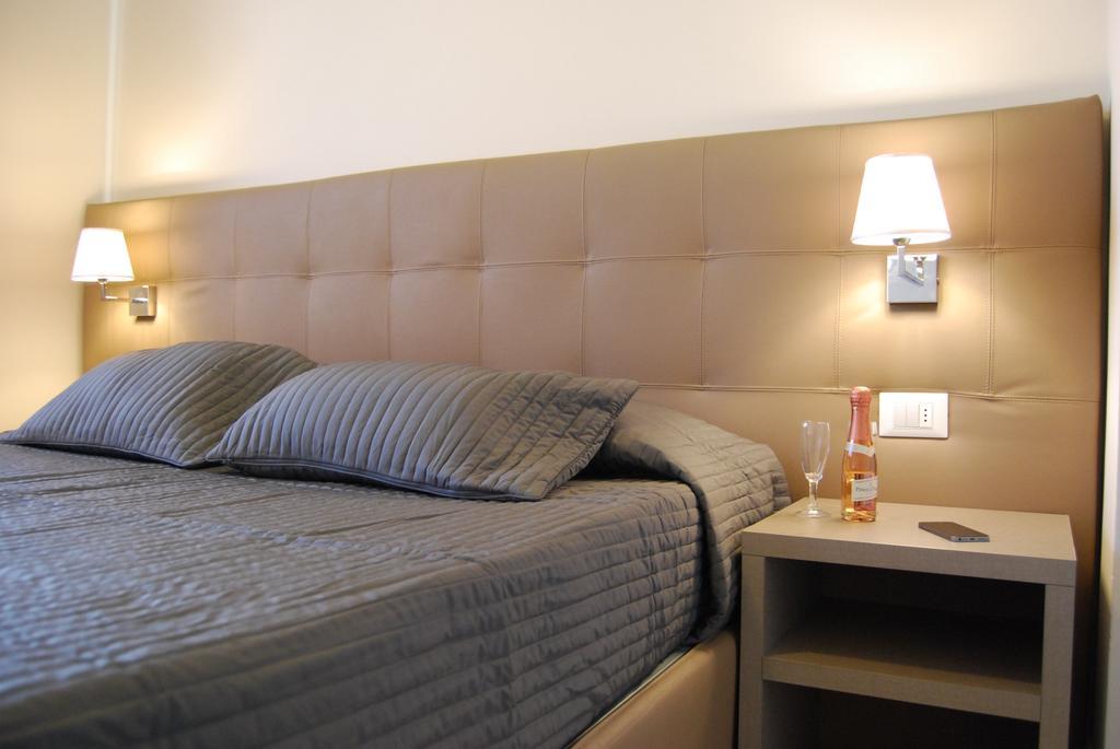Residenze Al Colle Dei Pini Aparthotel Ριτσόνε Δωμάτιο φωτογραφία